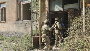 U.S. MARSOC Marines train on building breaching tactics with Georgian special operations forces soldiers during Trojan Footprint 24