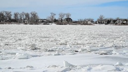 North Dakota National Guard UH-60 Black Hawk Helicopters Fight Missouri River Ice Jams
