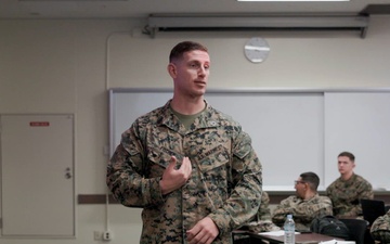 Gunnery Sgt. Michael Fischer explains the importance of SNCOA Faculty Advisors