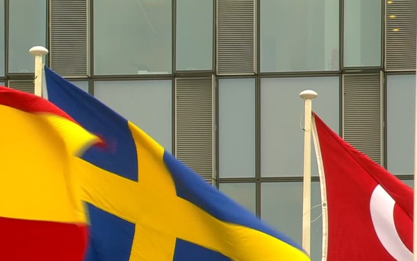 Accession of Sweden: Swedish flag raised at NATO Headquarters (B-ROLL)