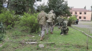 Georgian, and Spanish special operations forces soldiers train to clear a compound during Trojan Footprint 24