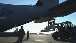 Airmen load AFCENT C-130s with humanitarian aid bound for Gaza