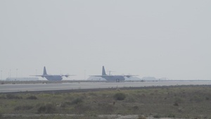 Airmen load AFCENT C-130s with humanitarian aid bound for Gaza