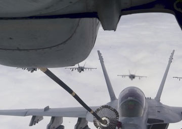 U.S. Marines with VMGR-252 conduct aviation-delivered ground refueling operations with Finnish F/A-18 Hornets