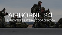 U.S.-Japan soar through heavy winds for Airborne 24