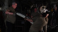910th maintainers retrofit C-130J to ops check aerial spray system