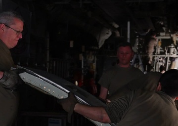 910th maintainers retrofit C-130J to ops check aerial spray system