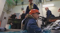 CLB 24 Marines Complete the Underwater Egress Trainer