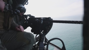 U.S. Marines with Marine Light Attack Helicopter Squadron (HMLA) 167 conduct precision-guided munitions delivery at maritime targets (B-Roll)