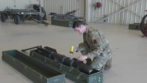 Precision Training in Action: Crew Equips MQ-9 Reaper with Mock Munitions