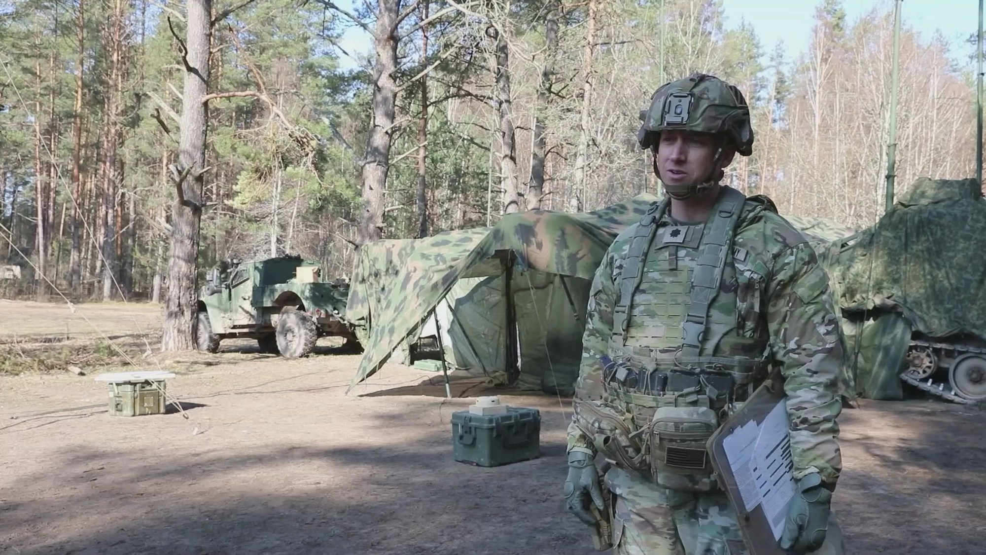 Lt. Col. Ben Maher, commander of 1st Battalion, 9th Field Artillery Regiment, 2nd Armored Brigade Combat Team, 3rd Infantry Division, talks about his unit conducting a battalion-wide Table XVIII field training exercise held at the Pabrade Training Area, Lithuania, March 26, 2024. Charlie Battery, along with the rest of the 1st Bn., 9th FAR and Lithuanian partners, practiced massing their fires in one location in a seamless display of interoperability and lethality. The 3rd Infantry Division’s mission in Europe is to engage in multinational training and exercises across the continent, working alongside NATO Allies and regional security partners to provide combat-credible forces to V Corps, America’s forward-deployed corps in Europe. (U.S. Army video by Sgt. Anthony Ford)