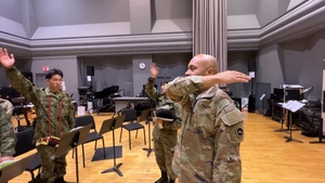 USARJ Band member teaches JGSDF members how to play the bugle