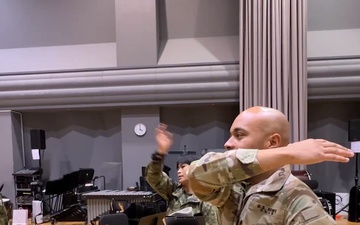 USARJ Band member teaches JGSDF members how to play the bugle