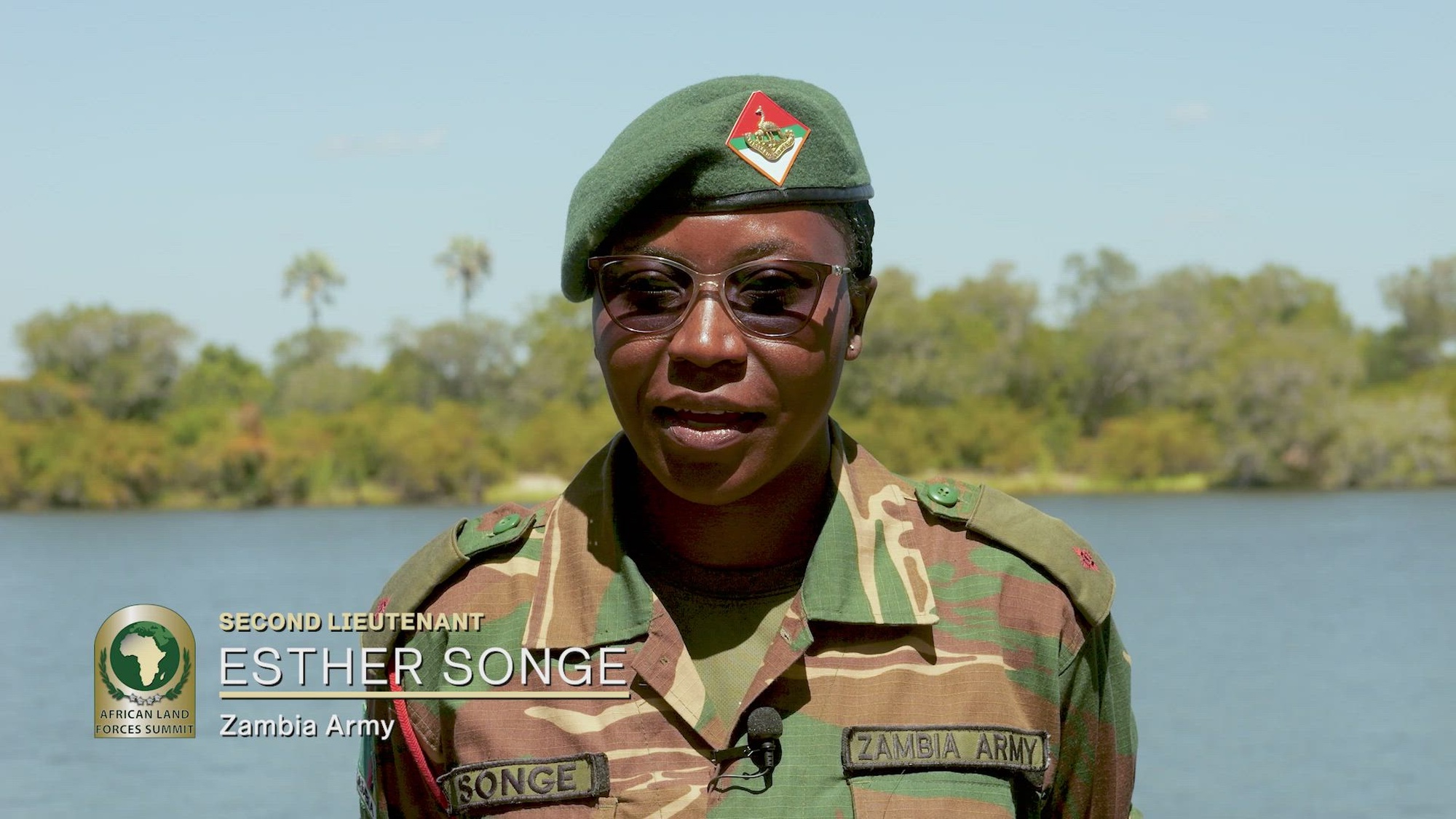 Zambian Army 2nd Lt. Esther Songe, public relations and protocol officer, sends a welcome greeting to this year's African Land Forces Summit (ALFS) participants.  ALFS 2024 is being held in Zambia, under the theme of “Regional solutions to transnational problems.” Sponsored by the U.S. Army Chief of Staff and co-hosted by the U.S. Army Southern European Task Force, Africa (SETAF-AF) and the Zambian Defense Force, ALFS 2024 brings together senior leaders from across Africa and other partner nations, April 22-26 in Livingstone, Zambia, to solidify relationships, exchange information on current topics of mutual interest and encourage cooperation in addressing challenges. (Courtesy asset from Zambia Army Public Affairs Office)