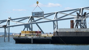 Crews remove containers on M/V Dali