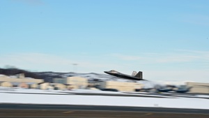 F-22 and C-17 Globemaster III takeoff B-roll