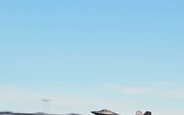 F-22 and C-17 Globemaster III takeoff B-roll