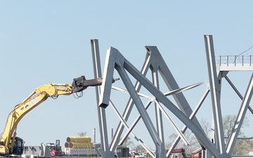 Large section of Francis Scott Key Bridge processed into smaller pieces at Sparrows Point, MD