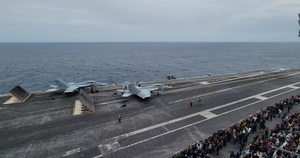Abraham Lincoln conducts flight operations on friends and family day cruise