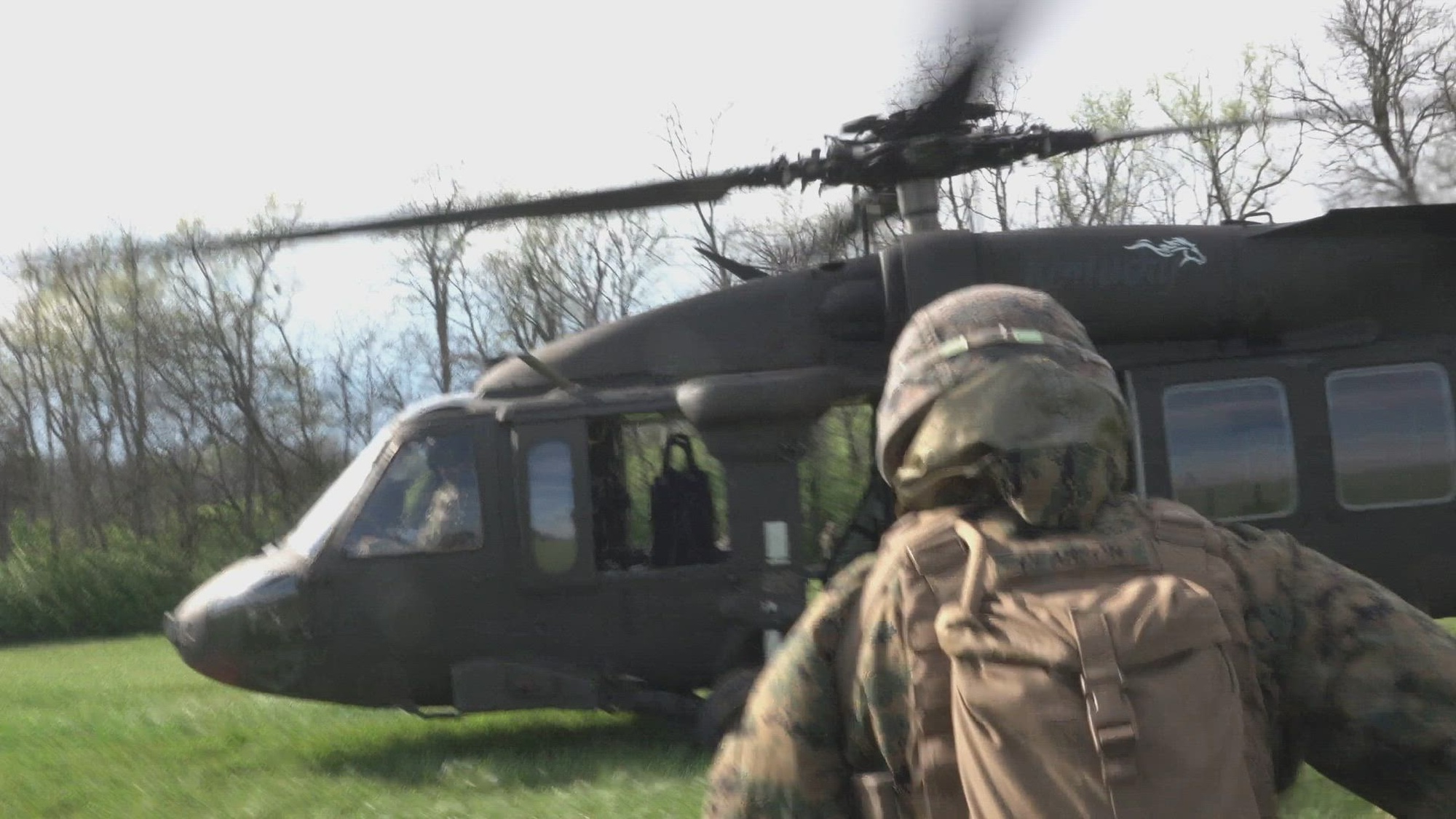 U.S. Marines with Alpha Company, 4th Law Enforcement Battalion, Force Headquarters Group, Marine Forces Reserve, conduct a joint air assault raid with the 63rd Theater Aviation Brigade, Kentucky National Guard at Camp Atterbury, Indiana, April 13, 2024. This exercise served to increase the interoperability between Marine reservists and National Guard troops, both in the air and on the ground. (U.S. Marine Corps video by Lance Cpl. Isaiah W. Smith)<br /><br />By License - This video contains music from a USMC enterprise licensed asset from Adobe Stock:<br /><br />&quot;Attack and Retreat by Eden Keyes” / https://stock.
