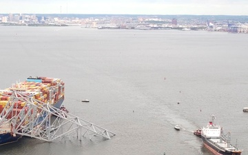 First ship passes through newly opened temporary channel on Patapsco River