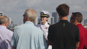 Residents of Miami tour the amphibious assault ship USS Bataan