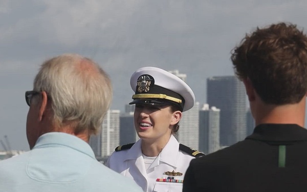 Residents of Miami tour the amphibious assault ship USS Bataan