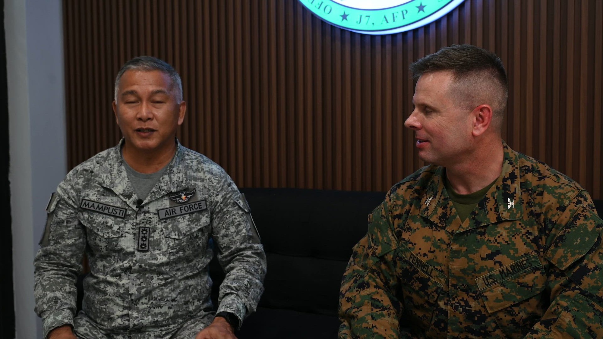 U.S. Marine Col. David Fennell, commanding officer of the 1st Civil Affairs Group and Philippine Air Force Col. Arman Mampusti, head of the civil military relations division, discuss civil affairs and the Combined Joint Civil Military Task Force during Exercise Balikatan 24 at Camp Aguinaldo, Philippines, April 29, 2024. BK 24 is an annual exercise between the Armed Forces of the Philippines and the U.S. military designed to strengthen bilateral interoperability, capabilities, trust, and cooperation built over decades of shared experiences. (U.S. Air Force video by Airman 1st Class Spencer Perkins)