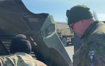 Soldiers assigned to 3rd BCT, 10th MTN DIV (LI) talk to NATO allies and prep military vehicles