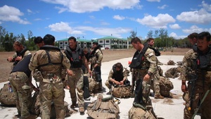 Jungle Operations Training Course students conduct helocast operations