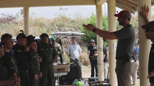 FBI conducts pistol marksmanship training with police forces from Colombia , Dominican Republic, and Guatemala at TRADEWINDS 24