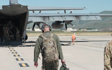 Ground crews preparing C-130H aircraft for MAFFS training flights