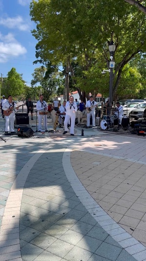 MIAMI (May 8, 2024)  U.S. Navy Sailors and Marines dance in Domino Park in Miami during Miami Fleet Week, May 8, 2024.