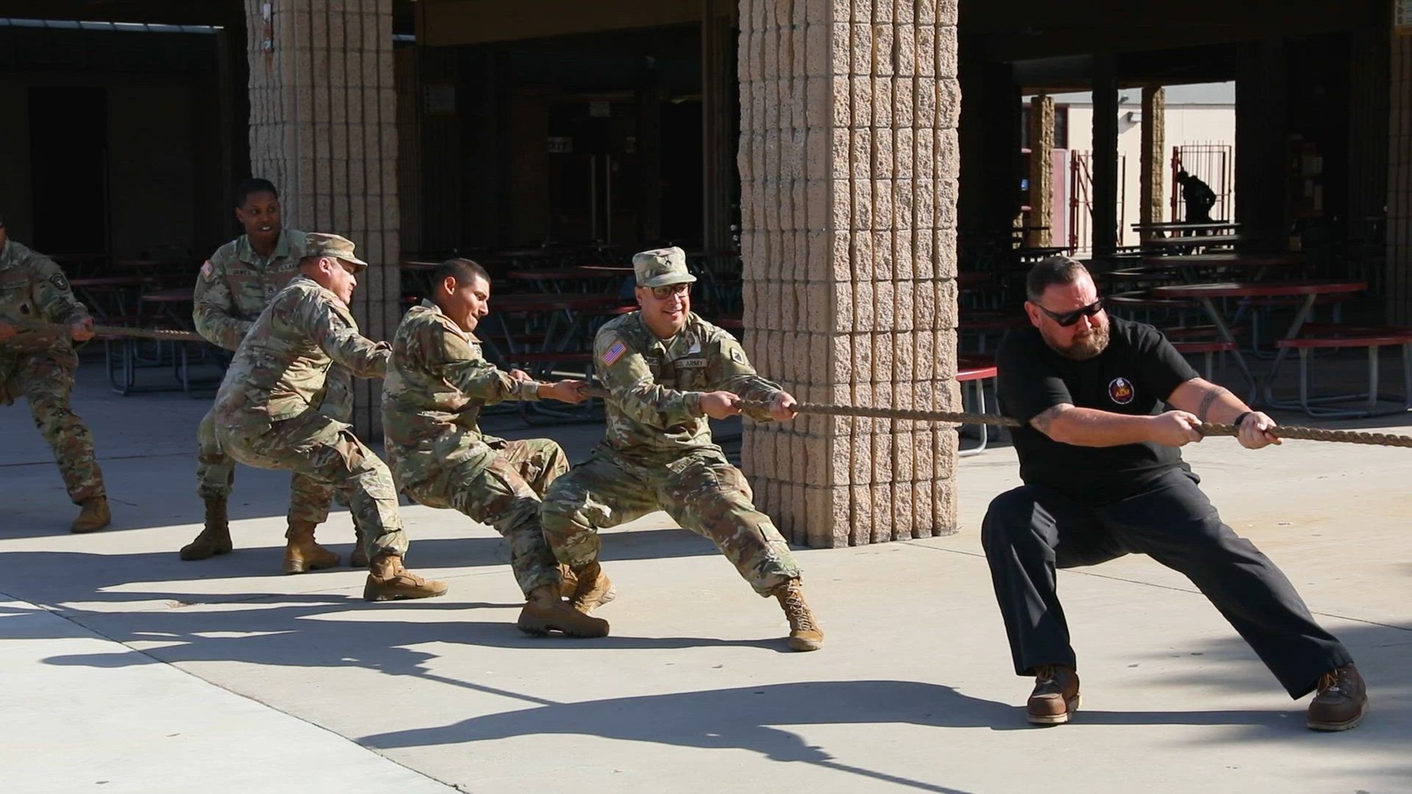 Exterior shots at several high schools feature Soldiers and school faculty playing tug of war with students, students learning about Explosive Ordnance Disposal armor, and students exercising to earn Army promotional items. The footage captures Soldiers interacting with students at the Southern California Army recruiting event in San Bernardino County and Orange County, California, from March 4 to 15, 2024. U.S. Army recruiters across Southern California regularly host public events where diverse groups of Army reservists and active-duty Soldiers interact with potential recruits, sharing their professional and personal experiences as U.