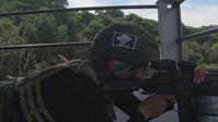 Competitors take part in Fuerzas Comando Skills and Shooting Tests III
