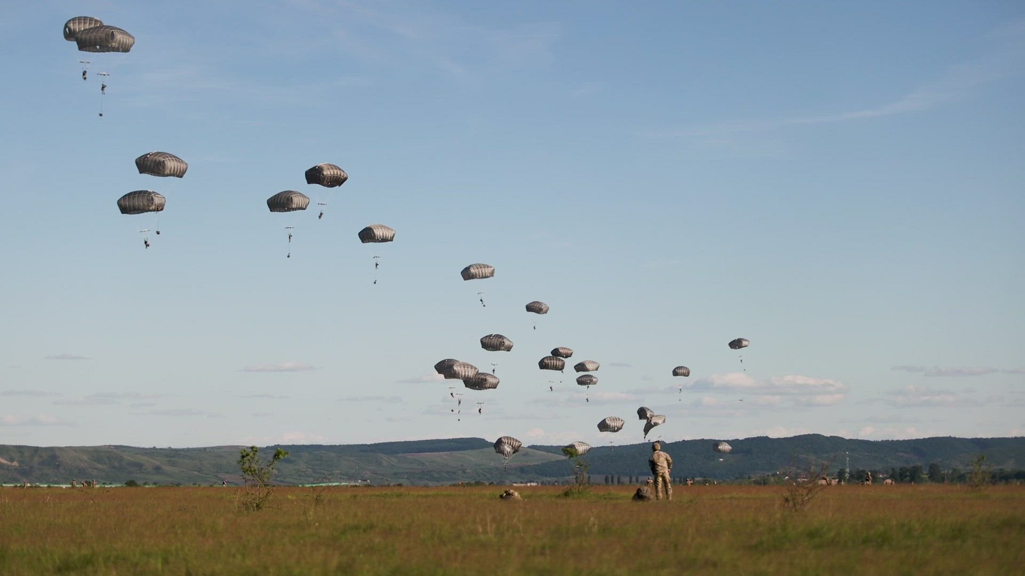 U.S. Army paratroopers, assigned to 82nd Airborne Division, execute Joint Force Entries as part of a multinational exercise, Swift Response 24, at Luna and Cincu, Romania, May 13-15, 2024. Swift Response, an annual exercise led by the U.S. Army Europe, focuses on improving the ability of allied airborne forces to rapidly and effectively manage crisis situations, operating seamlessly as a cohesive multinational unit. (U.S. Army video by Spc. Ashley Xie)