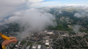 U.S. Army Parachute Team makes parachute jump with American flag for the 108th Indy 500