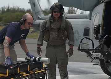 U.S. Marines and Sailors train simulated-casualty evacuation operations during Distributed Aviation Operations Exercise 24