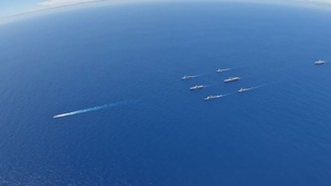 USS Ronald Reagan (CVN 76) steams in formation with 7th Fleet ships, Japan Maritime Self-Defense Force ships, as U.S. Navy, U.S. Air Force and Japan Air Self-Defense Force aircraft fly over in support of Valiant Shield 2024