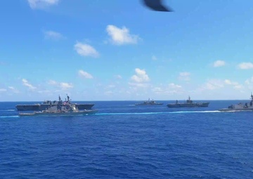 USS Ronald Reagan (CVN 76) steams in formation with 7th Fleet ships, Japan Maritime Self-Defense Force ships, as U.S. Navy, U.S. Air Force and Japan Air Self-Defense Force aircraft fly over in support of Valiant Shield 2024
