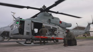 U.S. Marines with HMLA-167 perform maintenance during Distributed Aviation Operations Exercise 24 (B-Roll)