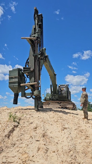 106th Engineer Detachment Soldiers drill holes for explosives on troop project at Fort McCoy, Part 1