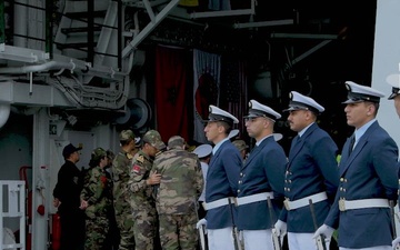 U.S. Navy Lt. Cmdr. Grace Reilly and U.S. Marine Corps Capt. Joseph Yanuzzi discuss African Lion 2024