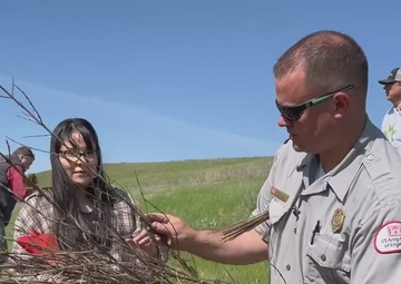 Omaha District partners with WOZU group to plant native vegetation near Standing Rock bike trails