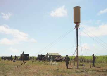 “Setting up shop&quot; Marines with MACS-4 set up air traffic control equipment.