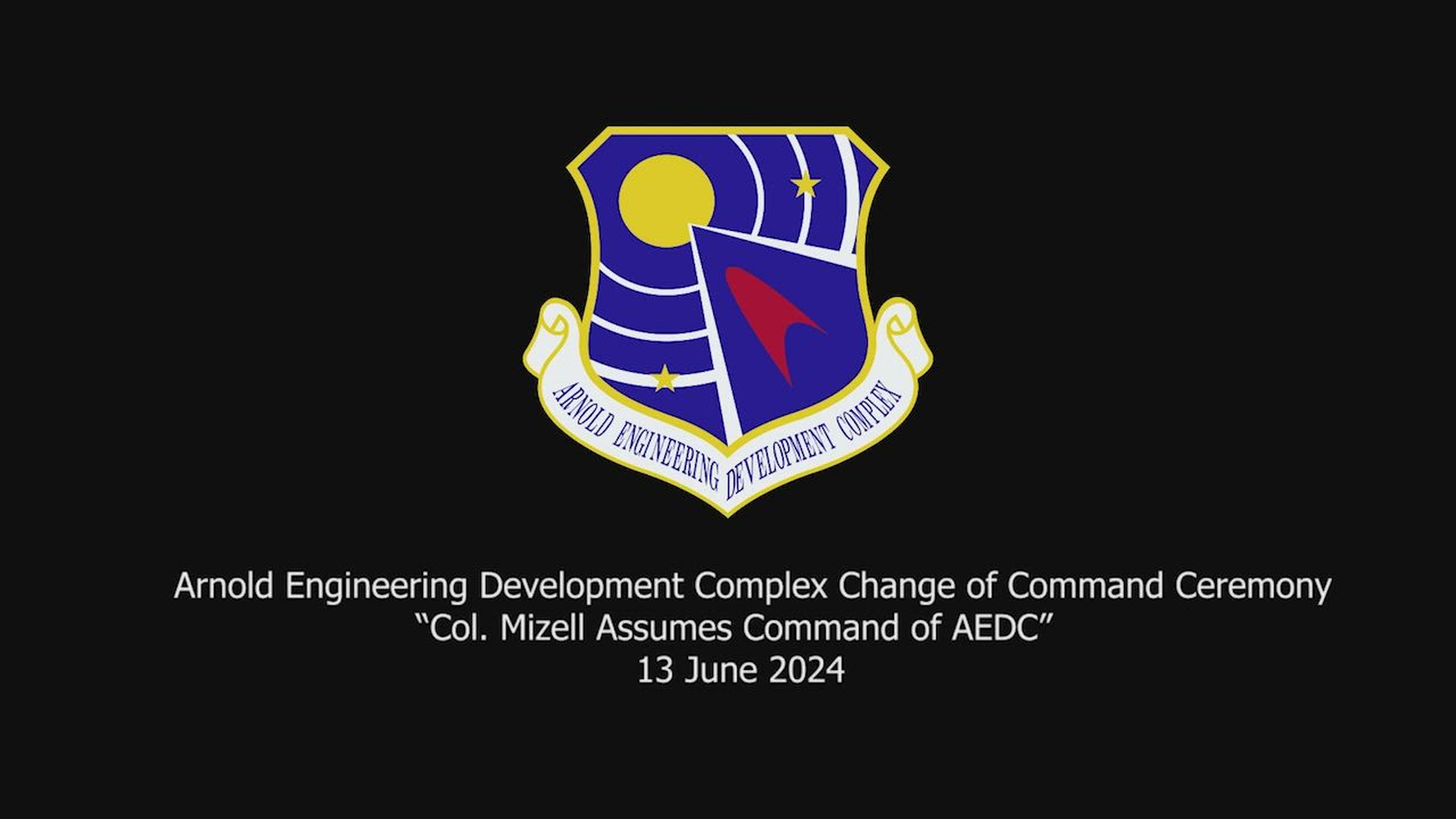 In a Change of Command ceremony at Arnold Air Force Base, outgoing commander Col. Gordon relinquishes command of AEDC to Col. Mizell.