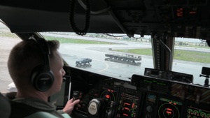 C-5M crew offloads cargo