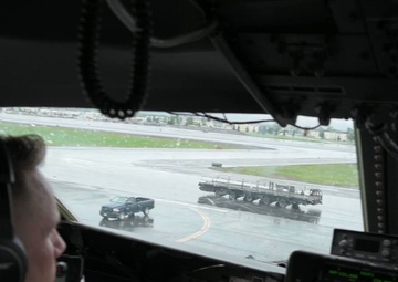 C-5M crew offloads cargo