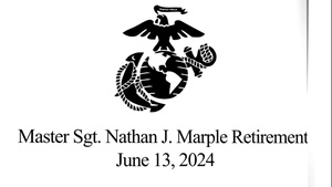Master Sgt. Marple “passes the torch” to Lance Cpl. Marple during his retirement