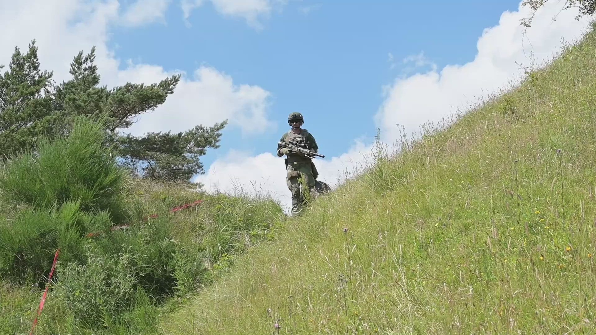 Sniper teams from various countries perform at the stress shoot lane during the Danish International Sniper Competition at Oksbol, Denmark, June 26, 2024. 32 teams from 14 nations compete and enhance teamwork with Allies and partner nations. (U.S. Army video by Markus Rauchenberger)